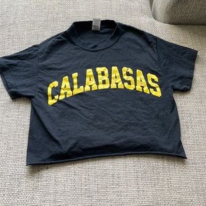 Black and yellow crop top.